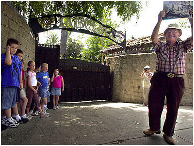 Dick Macy leads the first tour of Rubel Castle. The students are from Cullen Elementary School. 6/5/06