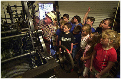 The 1986 Seth-Thomas clockworks that drives the high stone clock tower at Rubel Castle.