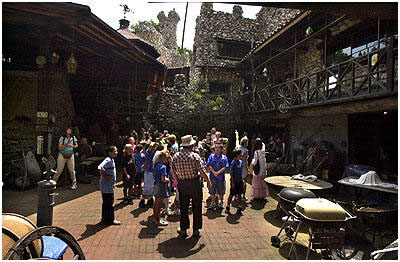 Dick Macy with the Cullen students in the courtyard of Rubel Castle.